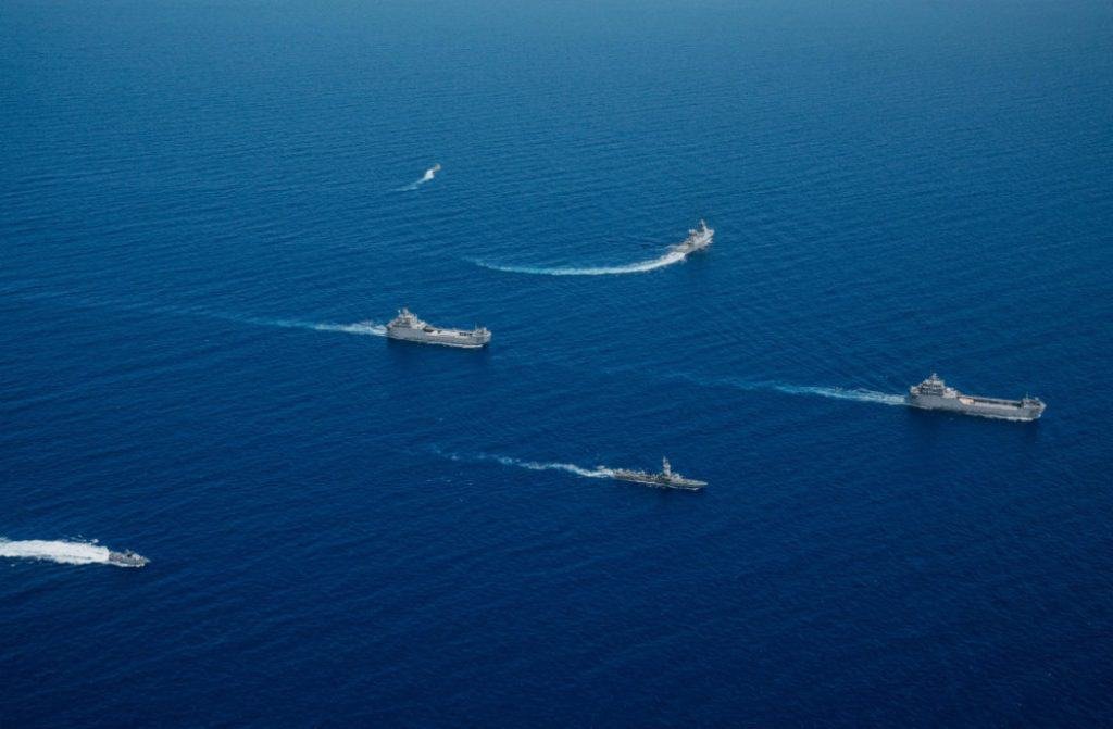 Israeli Navy ships escort the new INS Komemiyut (far right) as she arrives off the coast of Israel. (IDF image)
